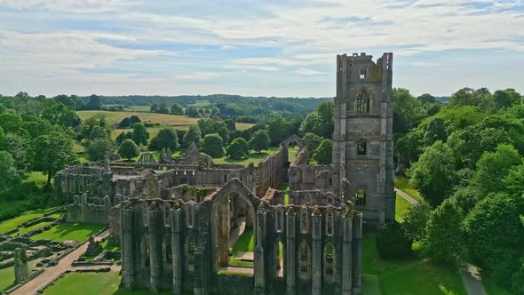 Drone aerial footage of the  historical 13th century Fountains Abby ruins in North Yorkshire - Engla