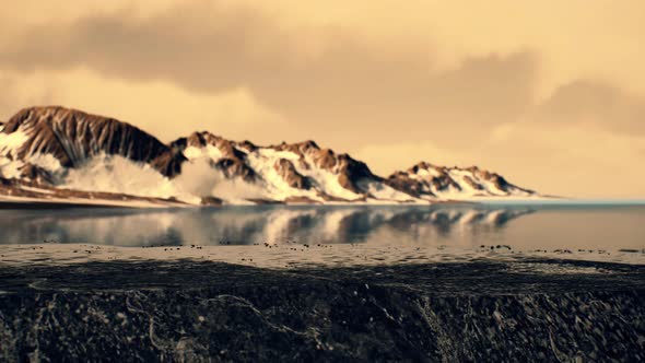 Coastline of Antarctica with Stones and Ice