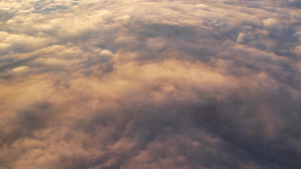 4K Sun is rising above sea of clouds until the horizon