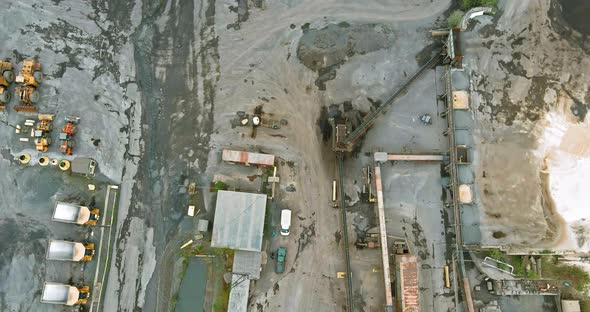 Aerial View of Opencast Mining Quarry with Lots of Machinery at Work in Middle of Pennsylvania USA