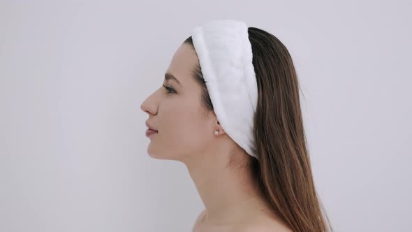 Profile of Young Girl in White Hoop in Beauty Salon.