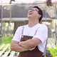Happy owner Asian man farmer standing in a hydroponics farm - VideoHive Item for Sale
