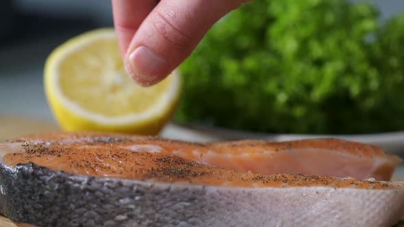 Chef Slicing Fish Steak.