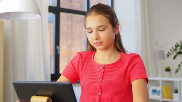 Student Girl with Tablet Pc Learning at Home