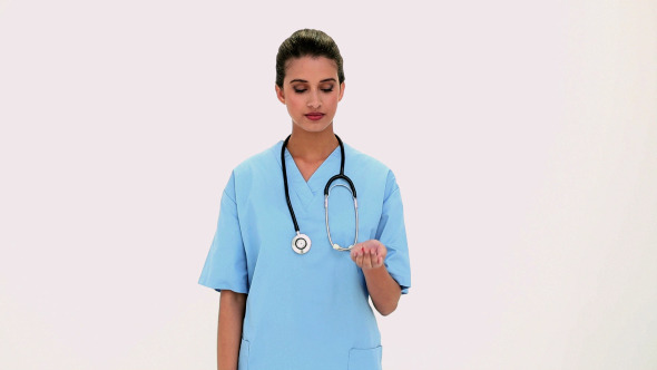 Content Beautiful Nurse Showing Red Pills In Hand alt