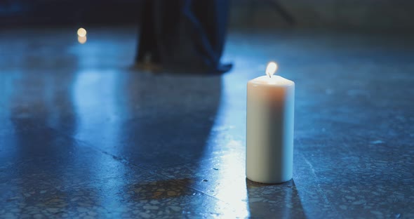 Candle in the Monastery Stands on the Floor