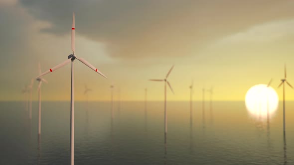 Large wind turbines with blades in field aerial view