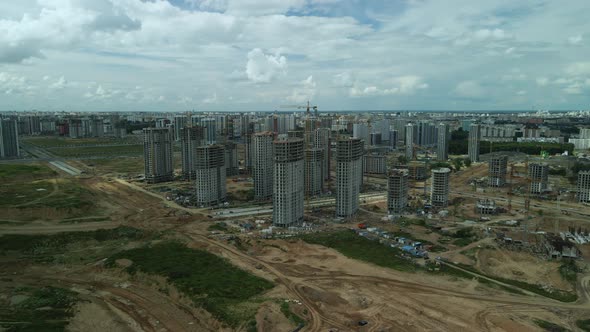 Construction site. Construction of multi-storey buildings. Construction of a city block. Aerial phot