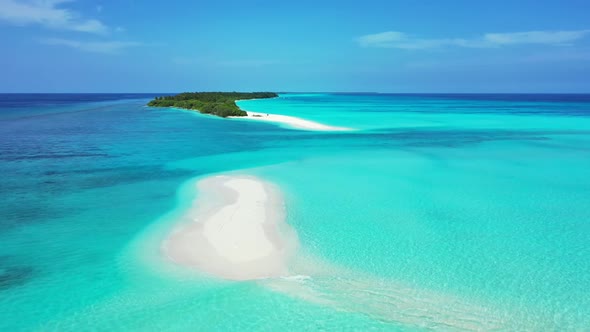 Aerial top down scenery of paradise shore beach trip by blue sea with white sand background of a pic