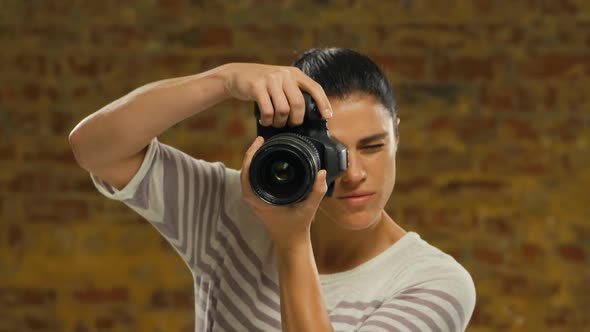 Young woman taking photo