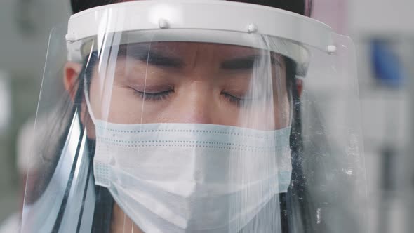 Close Up Of Doctor In Face Shield