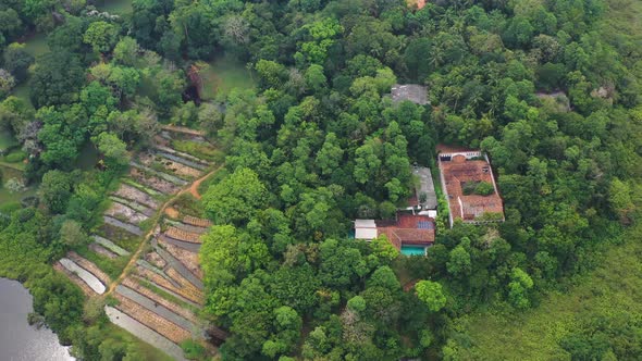 Aerial view of a house along lake Gregory, Bentota, Sri Lanka.