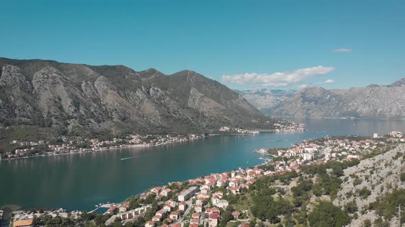 Aerial view of city Kotor in Montenegro. Flying over the Kotor Bay and mountains 