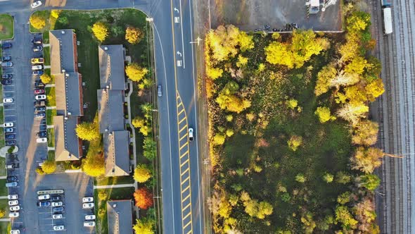 View of Typical Suburb Autumn Landscape on American Small Apartment Complex Near the Road and