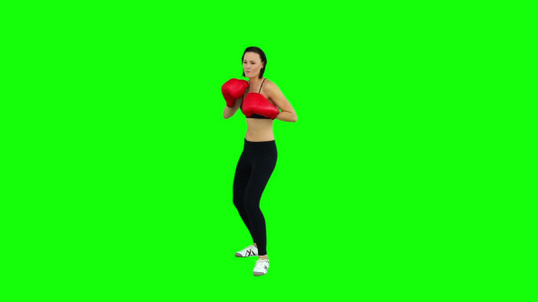 Fit Brunette Boxing With Red Gloves 2