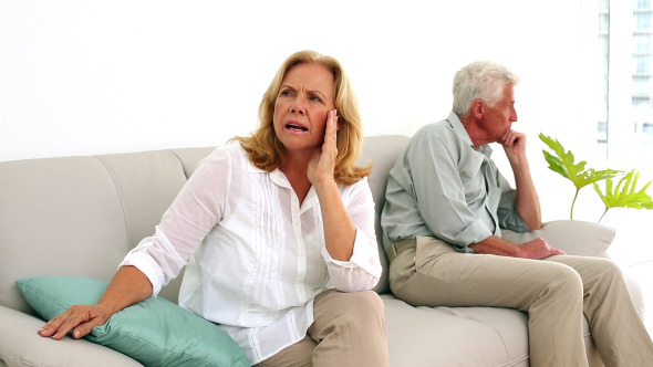 Retired Couple Fighting On The Couch