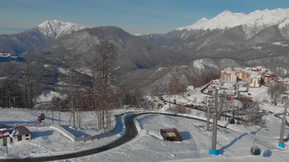 Aerial View of Small Picturesque Ski Resort Funicular and Hotels for Tourists and Sportsmen Winter