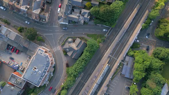 Commuter Trains at a Station in the UK Aerial Time Lapse