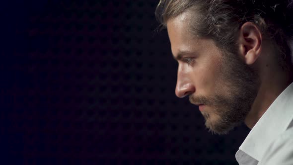 Portrait, Man Playing Chess, Close-up of a Man's Face on a Dark Background, Man Thinking