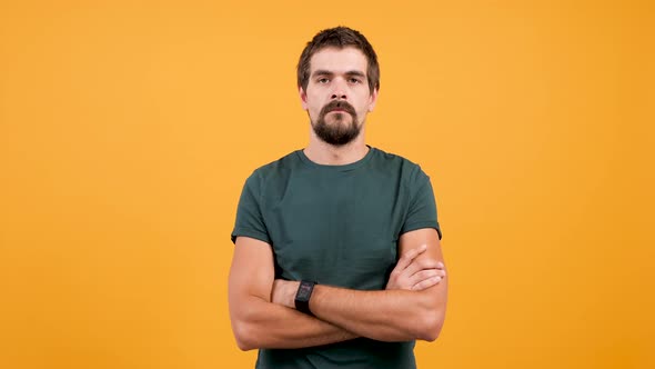Handsome Man in Casual T-shirt Sweating From Hot Weather