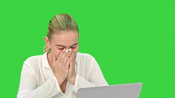 Woman Boss Tired at the End of Working Day, Yawning and Sleeping on a Green Screen, Chroma Key.