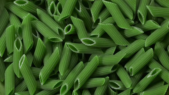 Green Pasta Closeup. Slow Rotation Top View