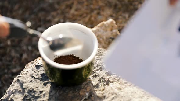 Cup with Hot Beverage and Steam in Slow Motion