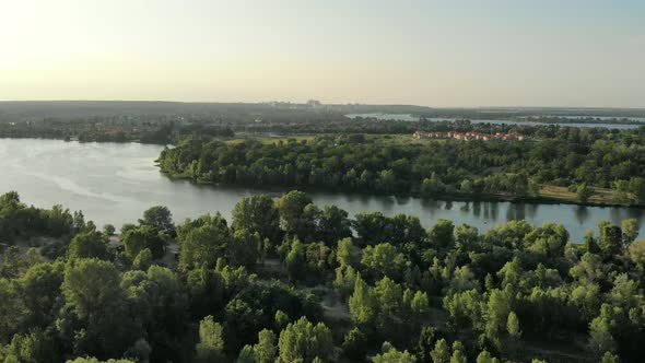 Aerial Above View of Village Houses Near Big River