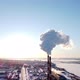 Chimneys of a Factory or Power Plant Produce Smoke at Sunrise Aerial View From a Drone - VideoHive Item for Sale