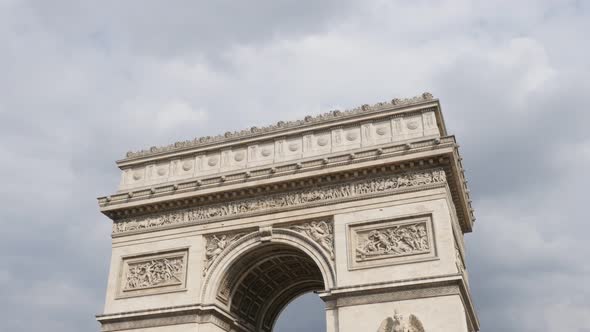 Great France and Paris famous symbol Arc de Triomphe  by the day 4K 2160p UltraHD tilt footage - Fre