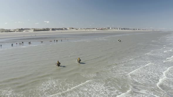 Aerial view of persons riding a horse, Vlaanderen, Belgium.