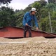 Woman working coffee on her farm in the high mountains - VideoHive Item for Sale