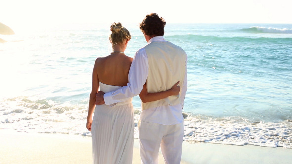 Newlyweds Looking Out To The Sea