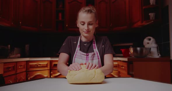 Woman Kneading Dough Making Bread Using Traditional Recipe