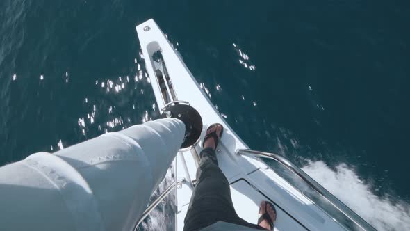 Beautiful White Yacht Breaks the Waves