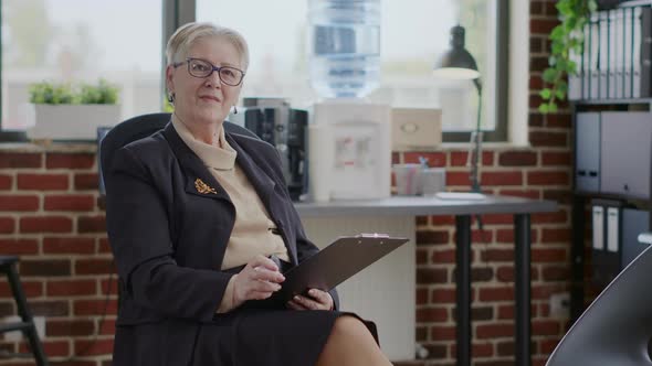 Portrait of Woman Therapist Getting Ready for Aa Therapy Meeting with Group of People