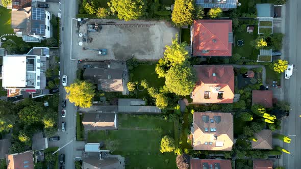 Birdseye aerial view suburban munich. drone flying top down over middle class family houses with sma