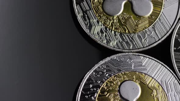 Rotating shot of Bitcoins (digital cryptocurrency) - Ripple