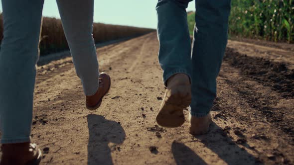 Closeup Farmers Shoes Walking Ground Road Rear View