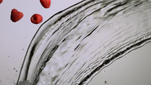 Water splash with fruit in ultra slow motion 1500fps - reflective surface - WATER SPLASH w FRUIT 014