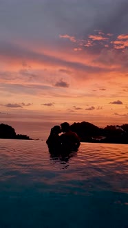 Couple Men and Women on a Luxury Vacation at a Pool Villa