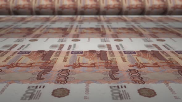 5000 Russian rubles bills on money printing machine.