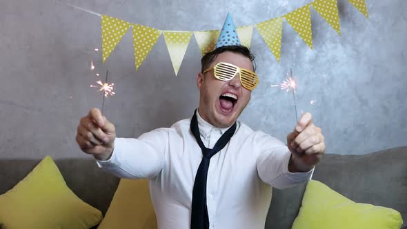 Loud Smiling Man Happy Birthday. A Very Happy Young Man Celebrates His Birthday