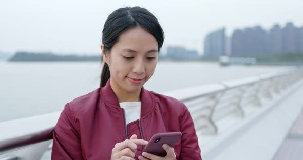 Woman use of smart phone at outdoor