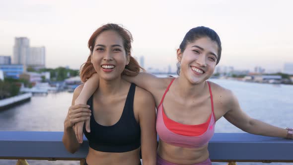 Female Fitness Trainer and Athlete at City Bridge