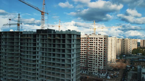 Panoramic aerial view. Construction of apartment building in green zone.