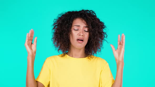 Pretty Mixed Race Woman Showing Blablabla Gesture with Hands Isolated on Teal Background