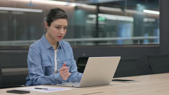 Indian Woman Having Wrist Pain While Using Laptop