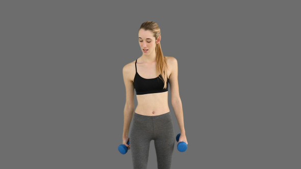 Fit Model Lifting Dumbbells 2