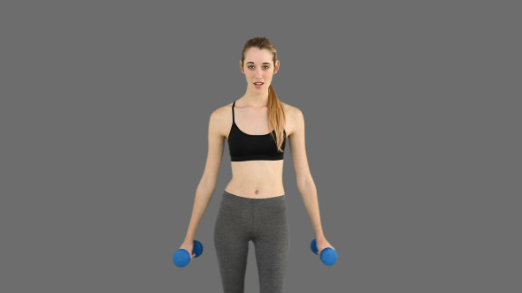 Fit Model Raising Dumbbells 2